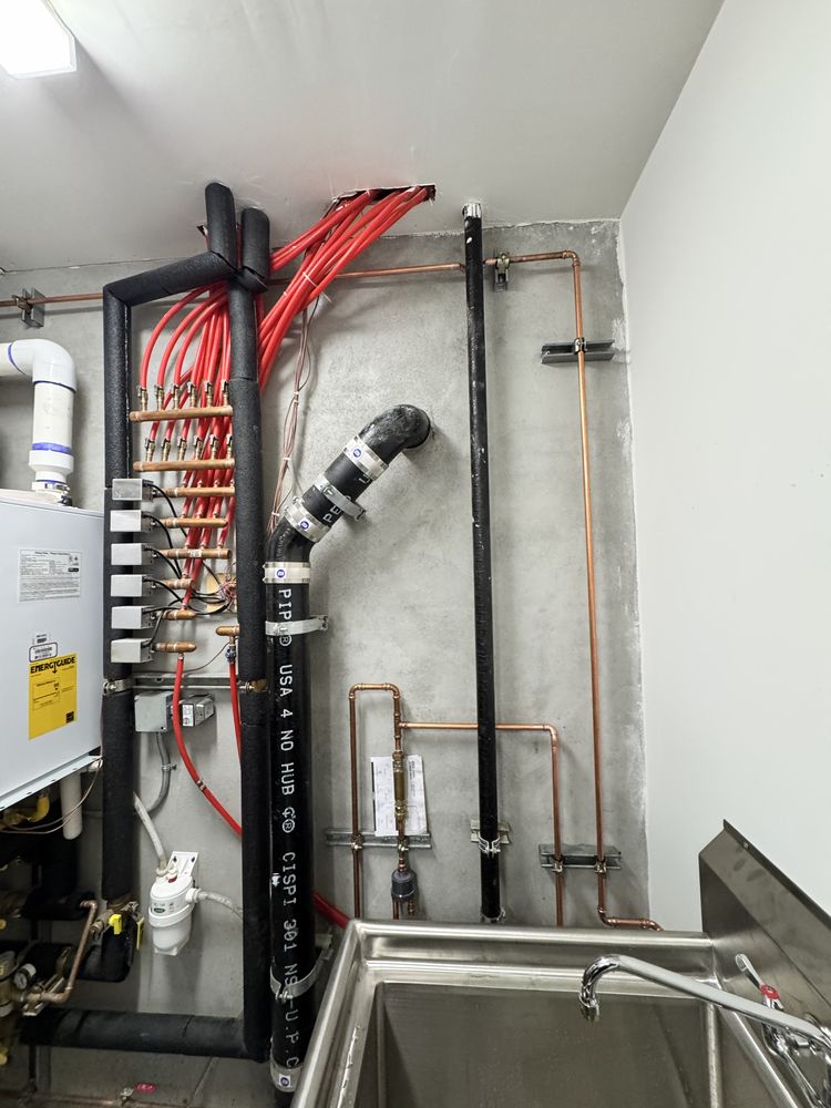 Professionally organized PEX manifold and tankless water heater installation by 5Star Plumbing Advanced